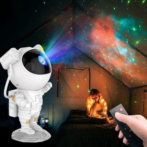 Astronaut toy with a remote control projecting colorful lights in a room.